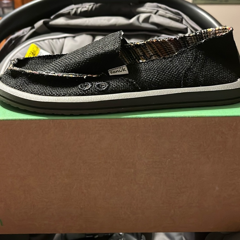 Brand New with tags women’s black Sanuk shoes